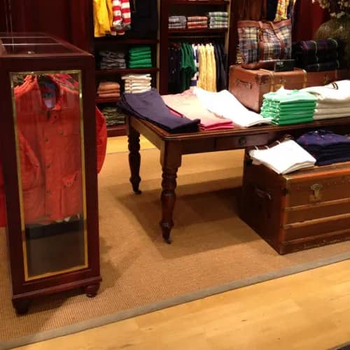 Contract Coir Natural area rug in clothing boutique