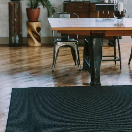 Oslo Black area rug in dining room