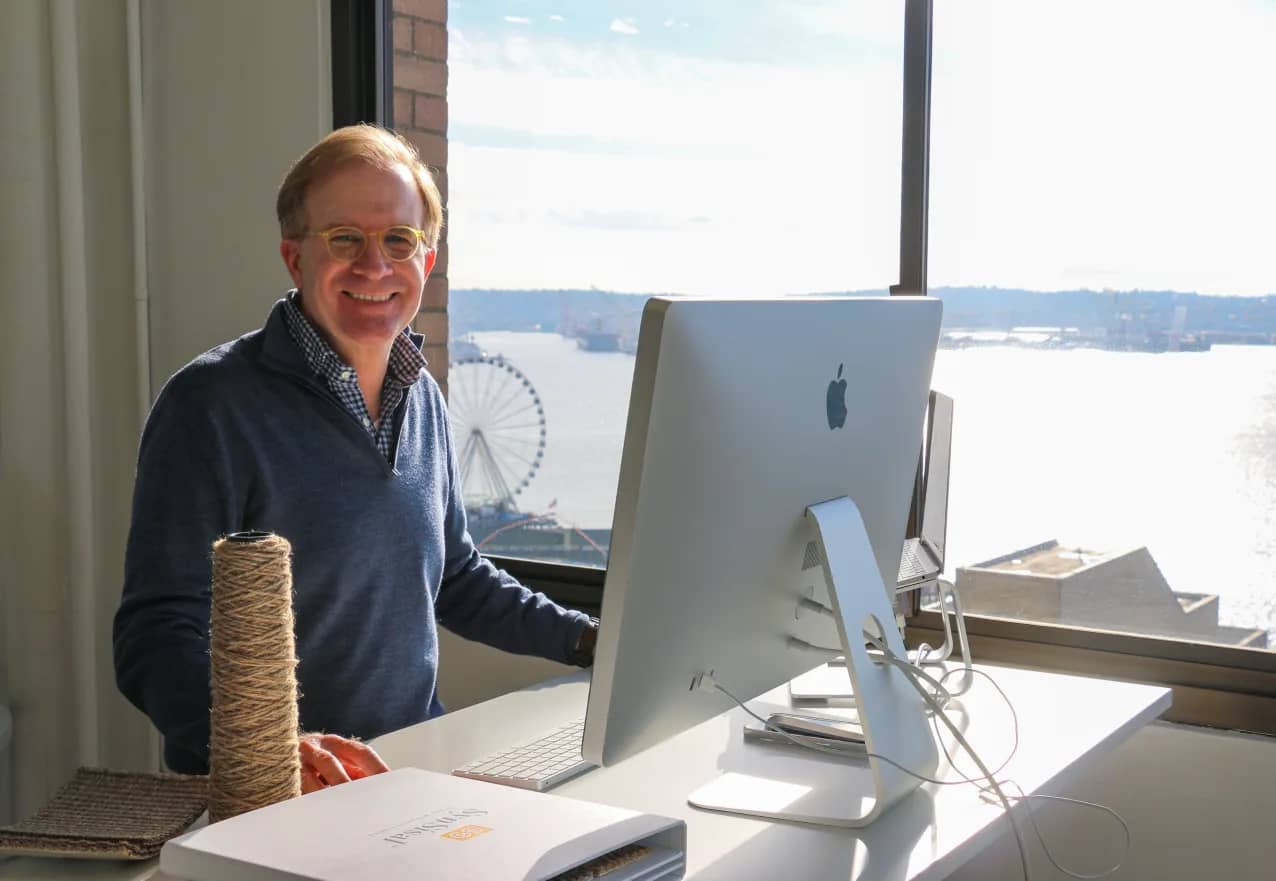 Curran & sisalcarpet.com Founder & CEO Jeff Curran at his desk in Seattle