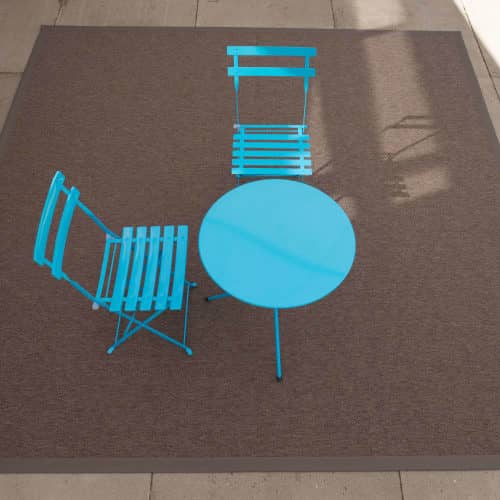 Bowen Cocoa polypropylene outdoor rug on patio